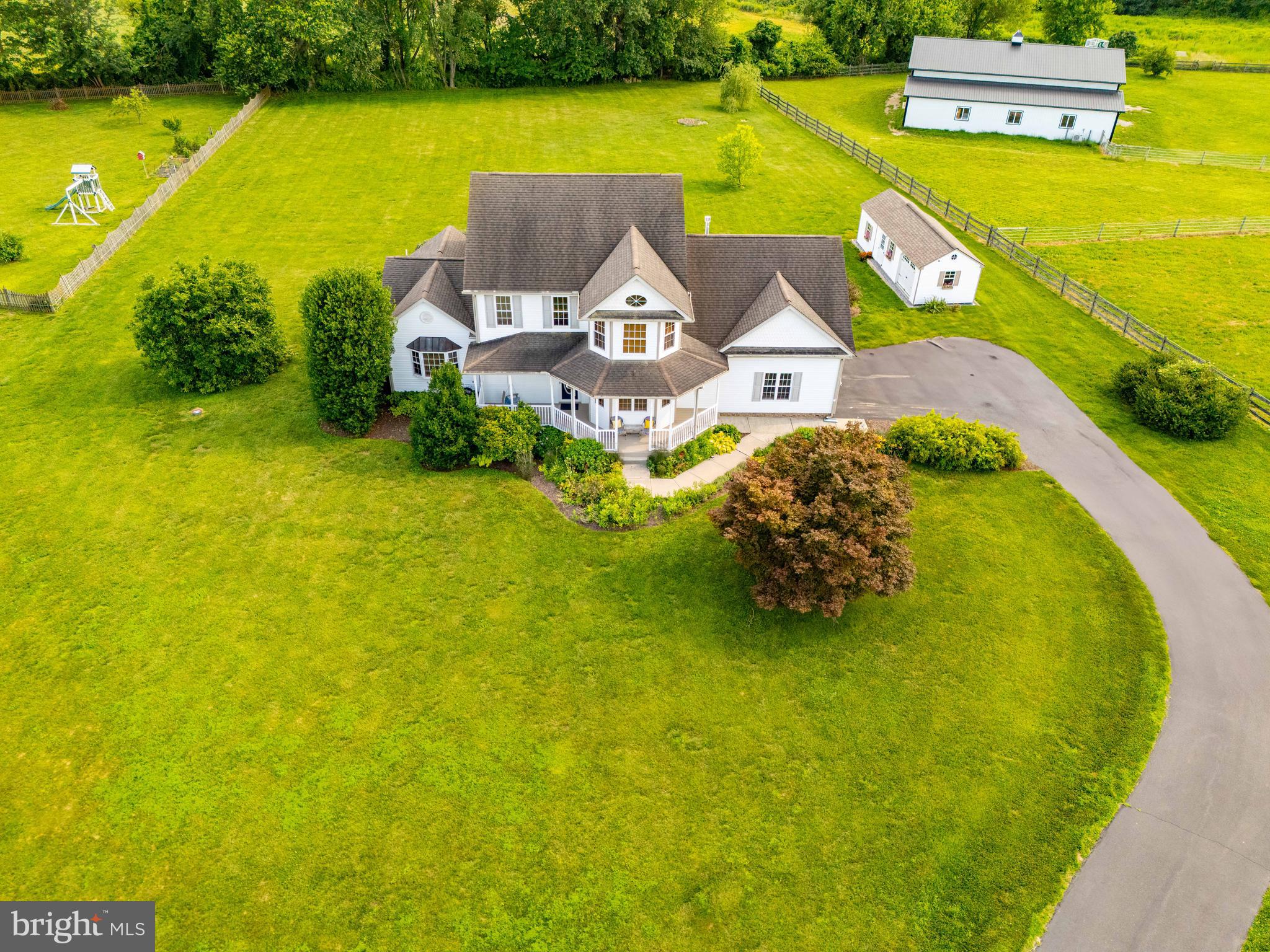 522 Little New York Road Rising Sun, MD 21911 - Photo 1 of 72 an aerial view of a house with a ocean view