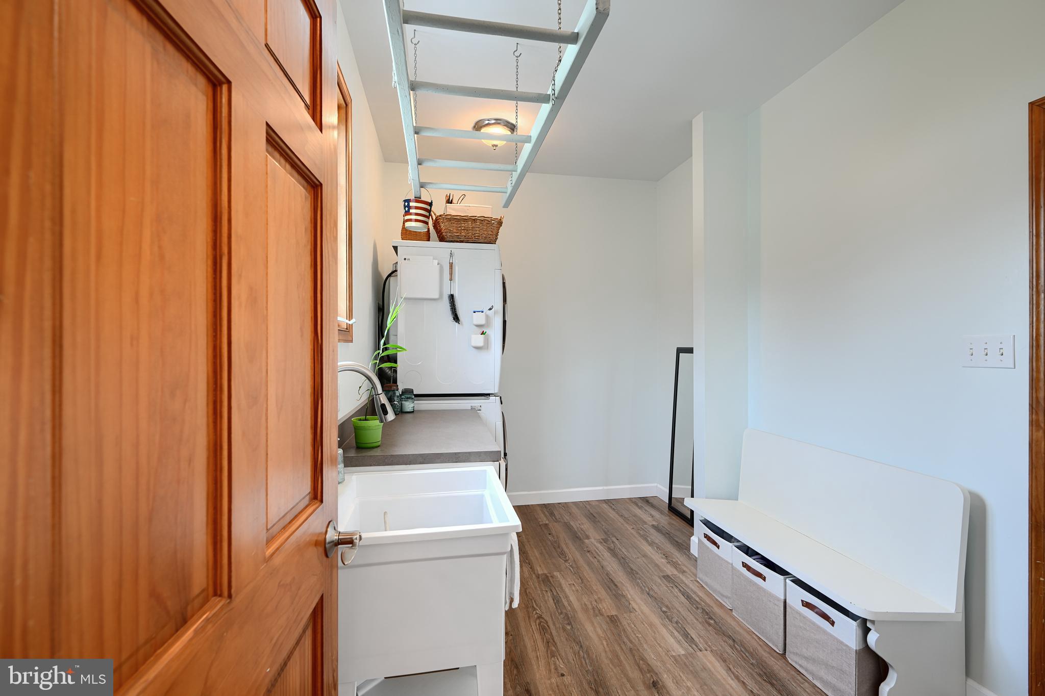 522 Little New York Road Rising Sun, MD 21911 - Photo 31 of 72 a view of a hallway with wooden floor and staircase