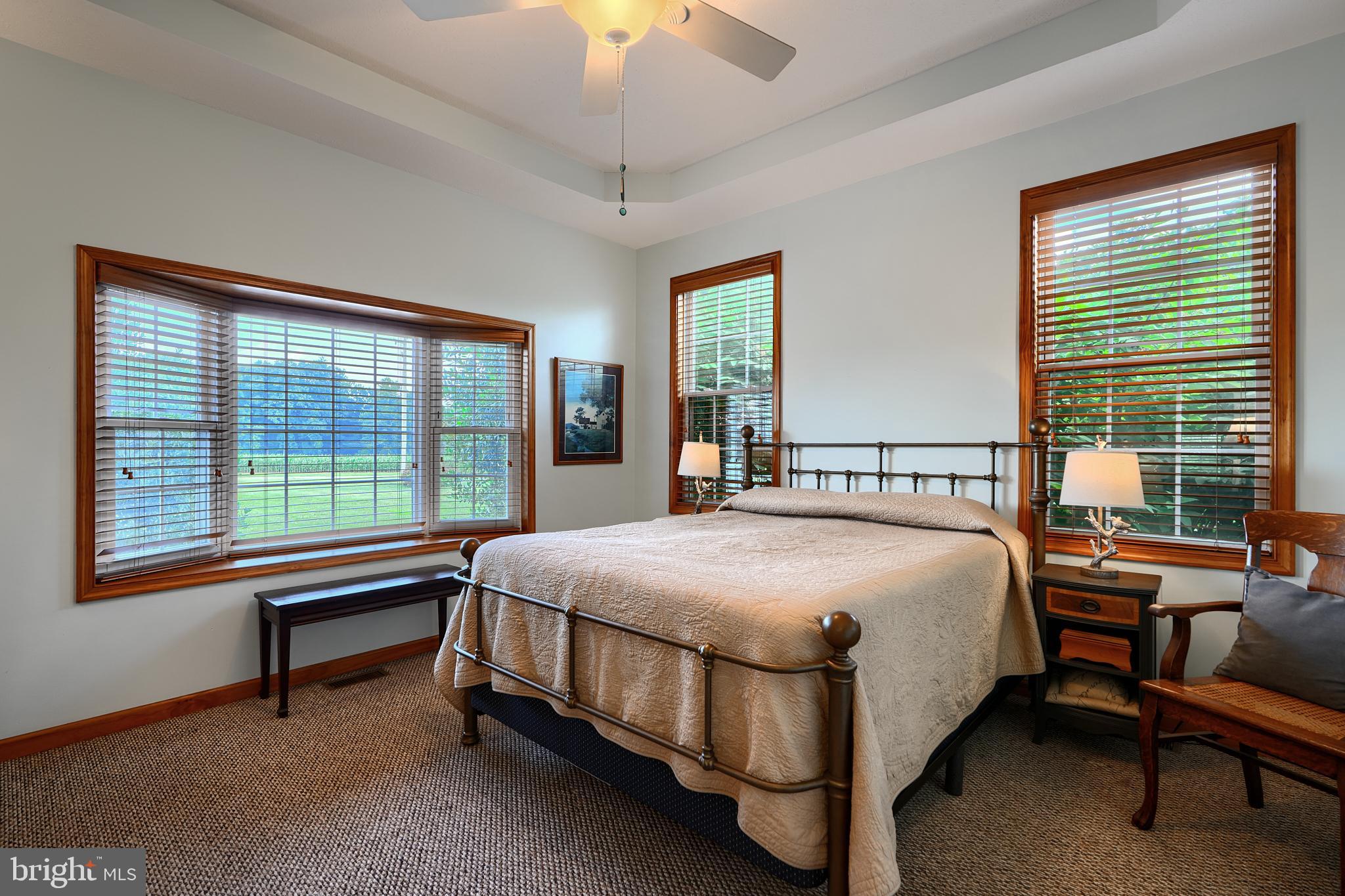 522 Little New York Road Rising Sun, MD 21911 - Photo 32 of 72 a bed sitting in a spacious bedroom next to a window
