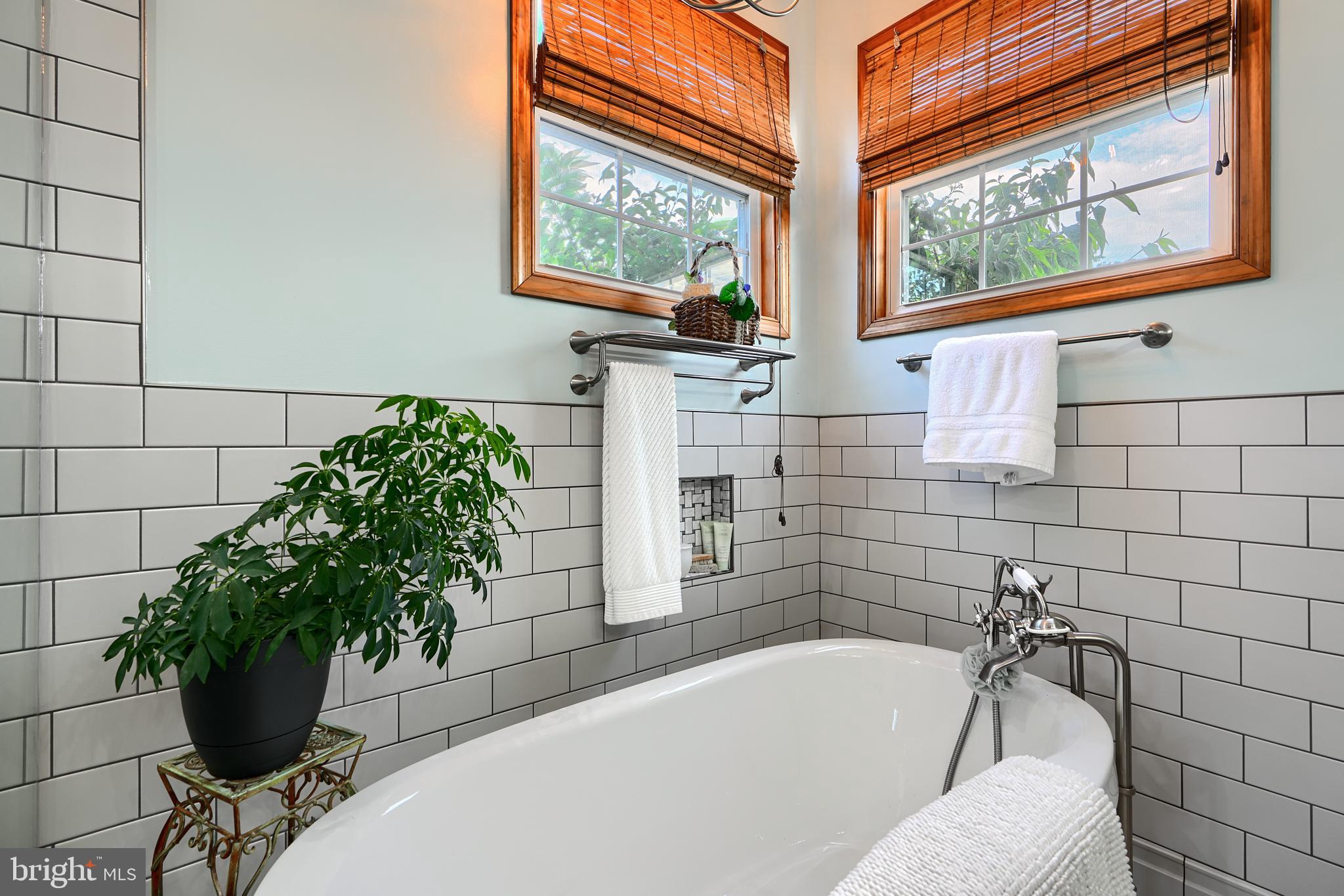 522 Little New York Road Rising Sun, MD 21911 - Photo 38 of 72 a bath tub sitting in a bathroom next to a window
