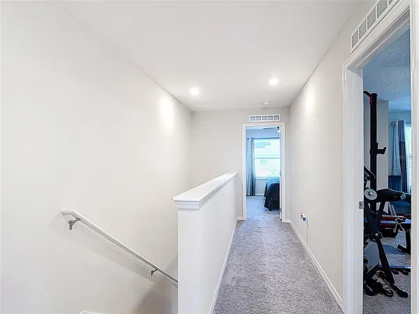 a view of a bathroom from the hallway