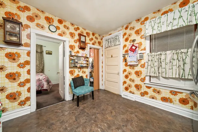 a living room with blue wall and a shower curtain