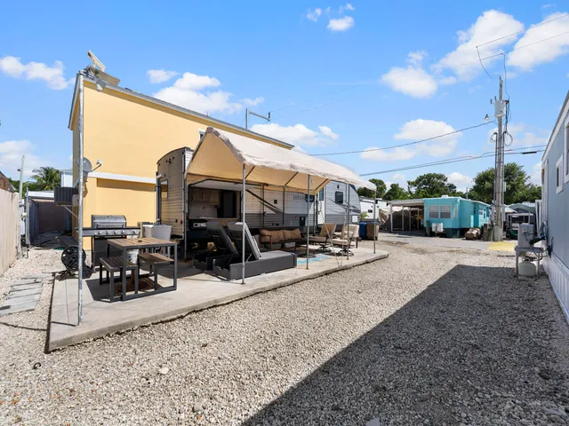 a view of a porch with furniture