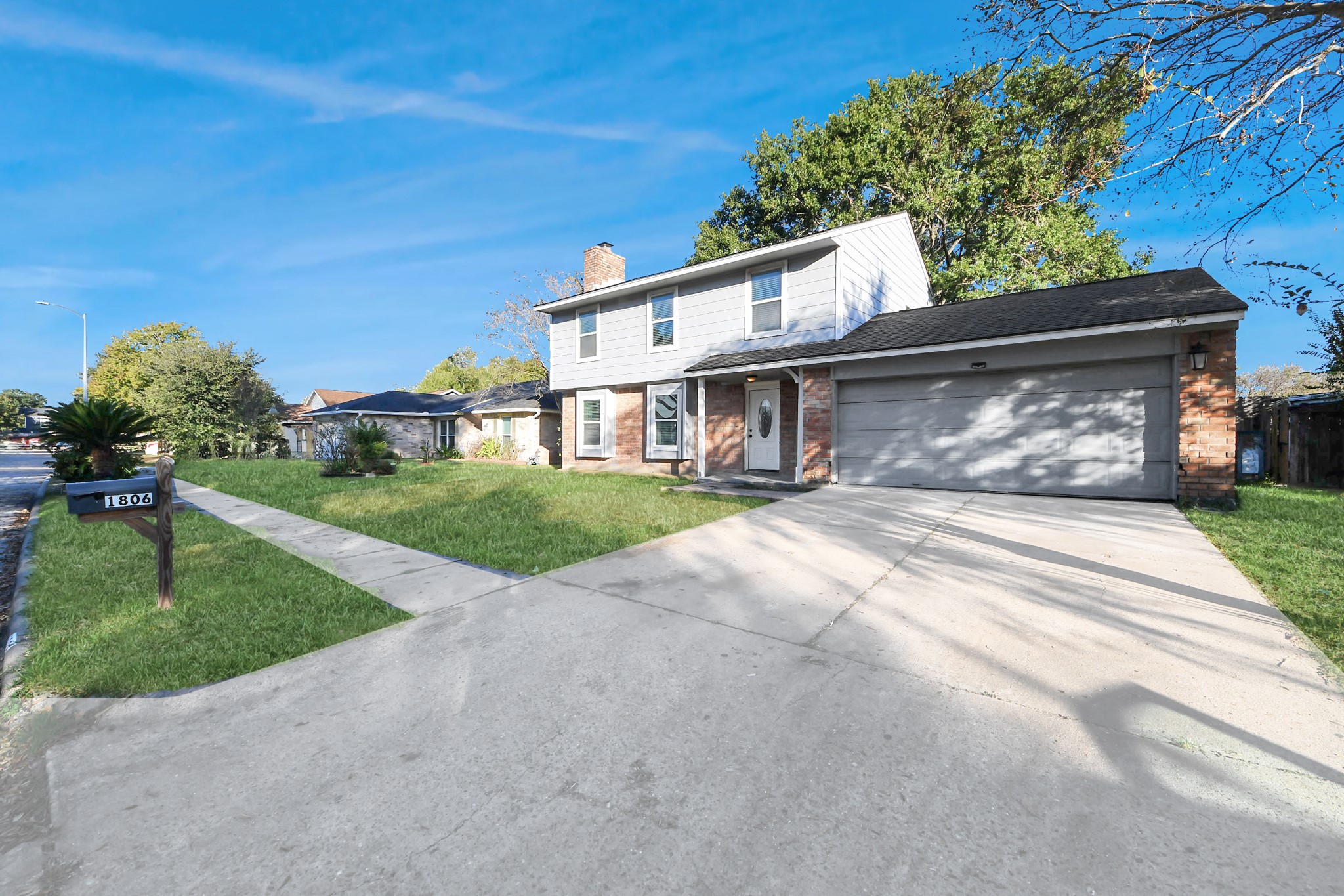 1806 Lacewing Lane Houston, TX 77067 - Photo 39 of 49 a view of a house with a yard