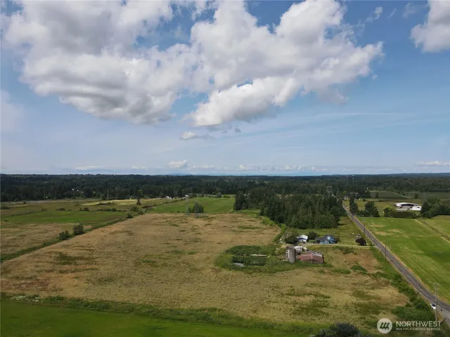 a view of a lake with a city