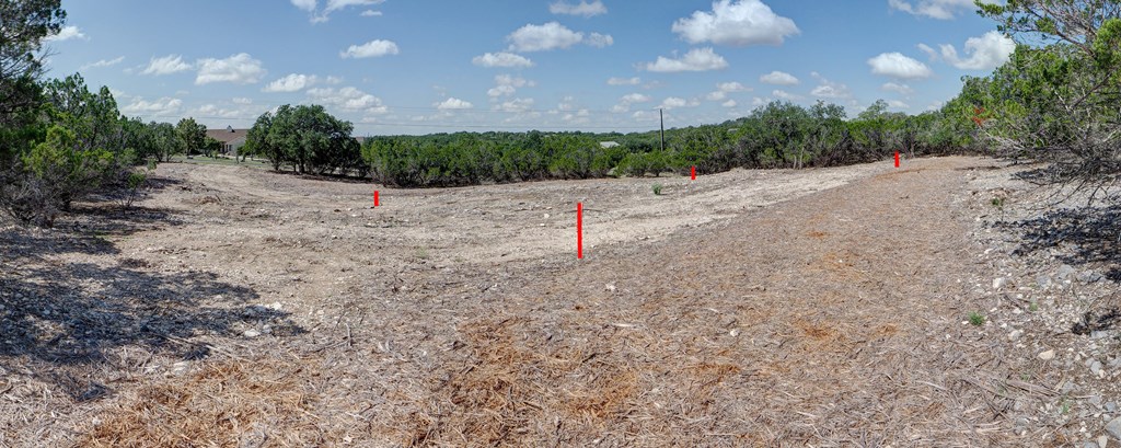 570 Ranch Rim Drive West, Unit 455 Ingram, TX 78025 - Photo 19 of 19 a view of a road with a yard