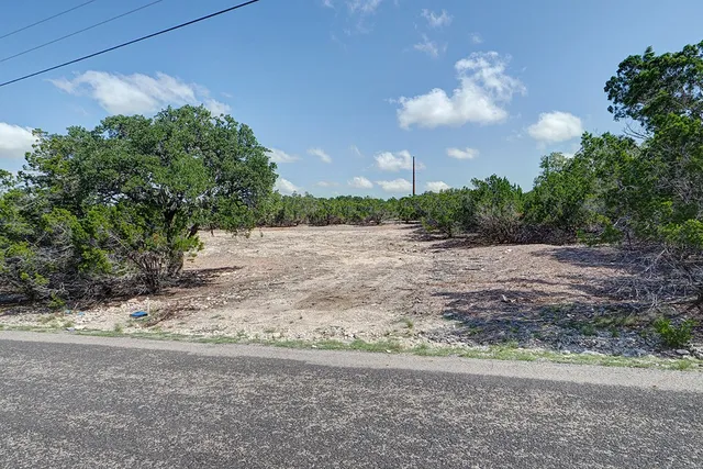 a view of a yard and a yard