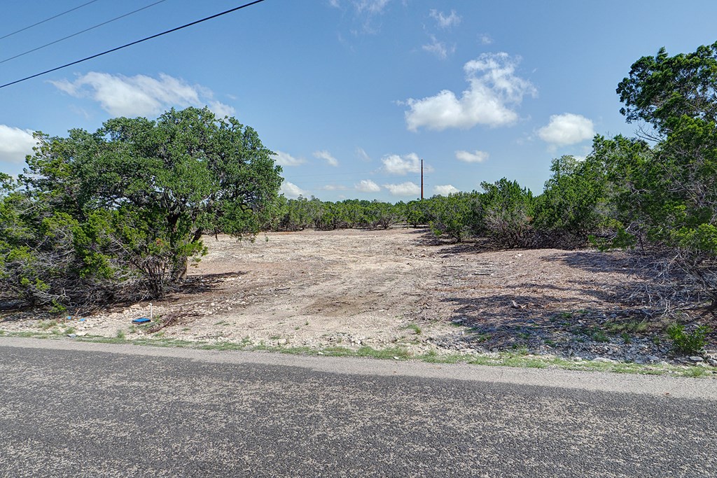 570 Ranch Rim Drive West, Unit 455 Ingram, TX 78025 - Photo 2 of 19 a view of a yard and a yard