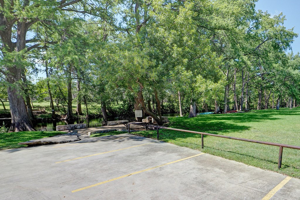 570 Ranch Rim Drive West, Unit 455 Ingram, TX 78025 - Photo 6 of 19 a park with bench and trees