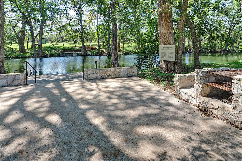 570 Ranch Rim Drive West, Unit 455 Ingram, TX 78025 - Photo 7 of 19 a view of backyard with green space
