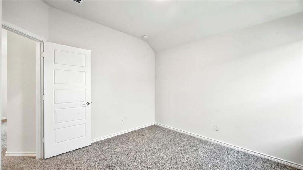 3413 Amaretto Road Aubrey, TX 76227 - Photo 10 of 34 a view of an empty room