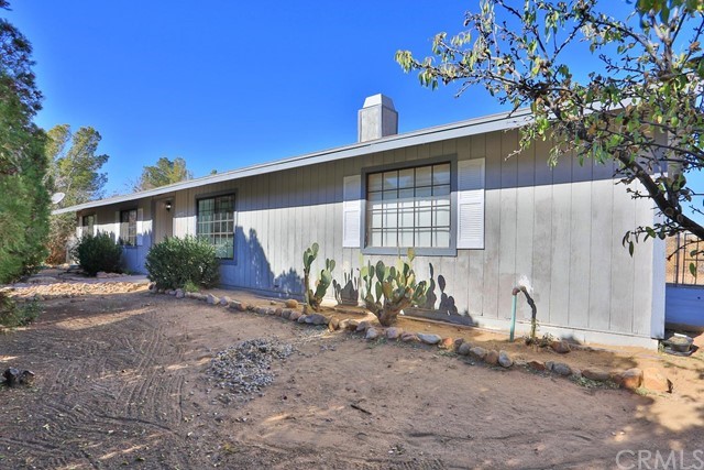 16792 Nisqualli Road Victorville, CA 92395 - Photo 1 of 1 a view of a house with a yard