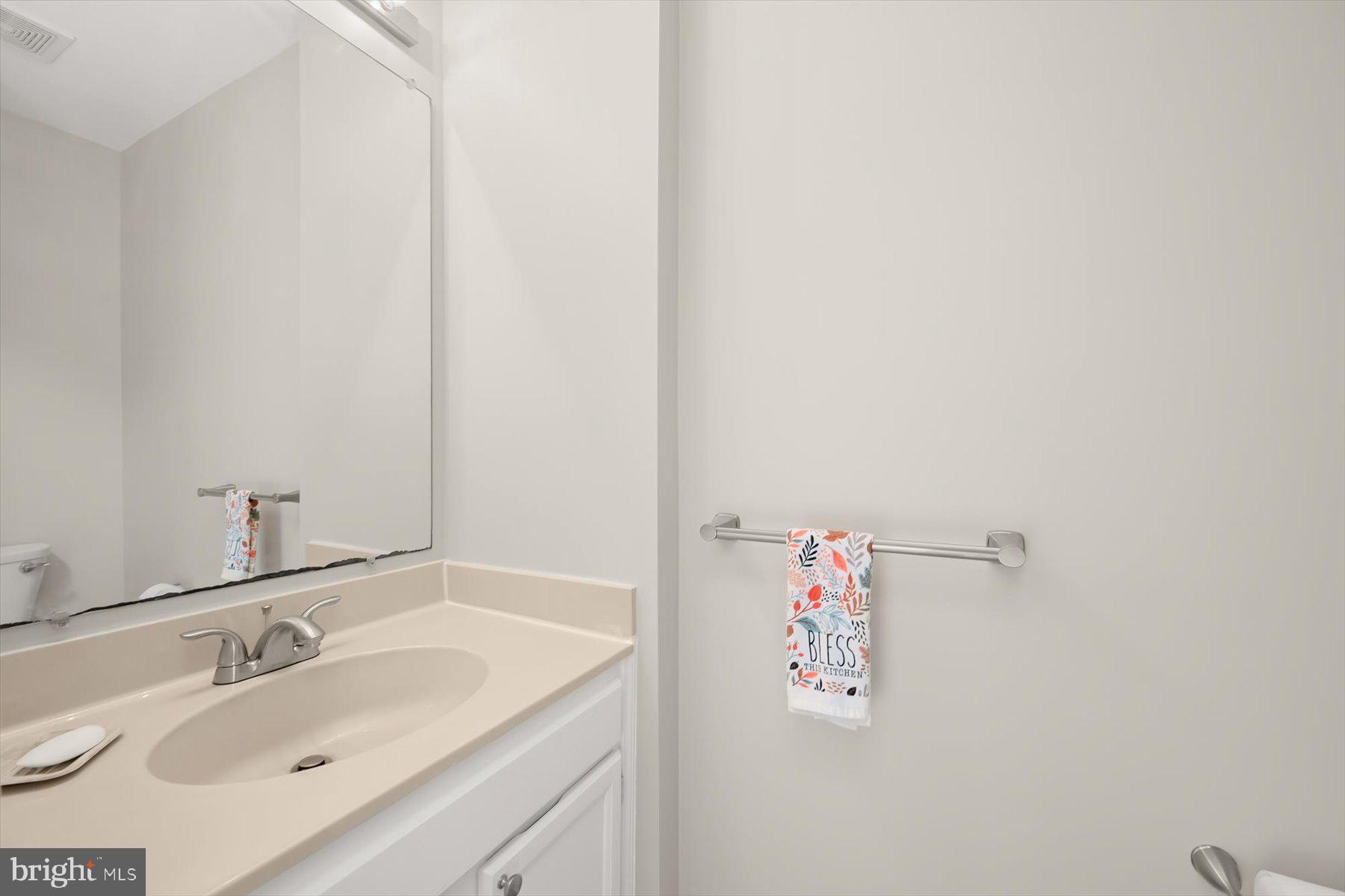 17 Offspring Court Perry Hall, MD 21128 - Photo 11 of 42 a bathroom with a sink and a mirror