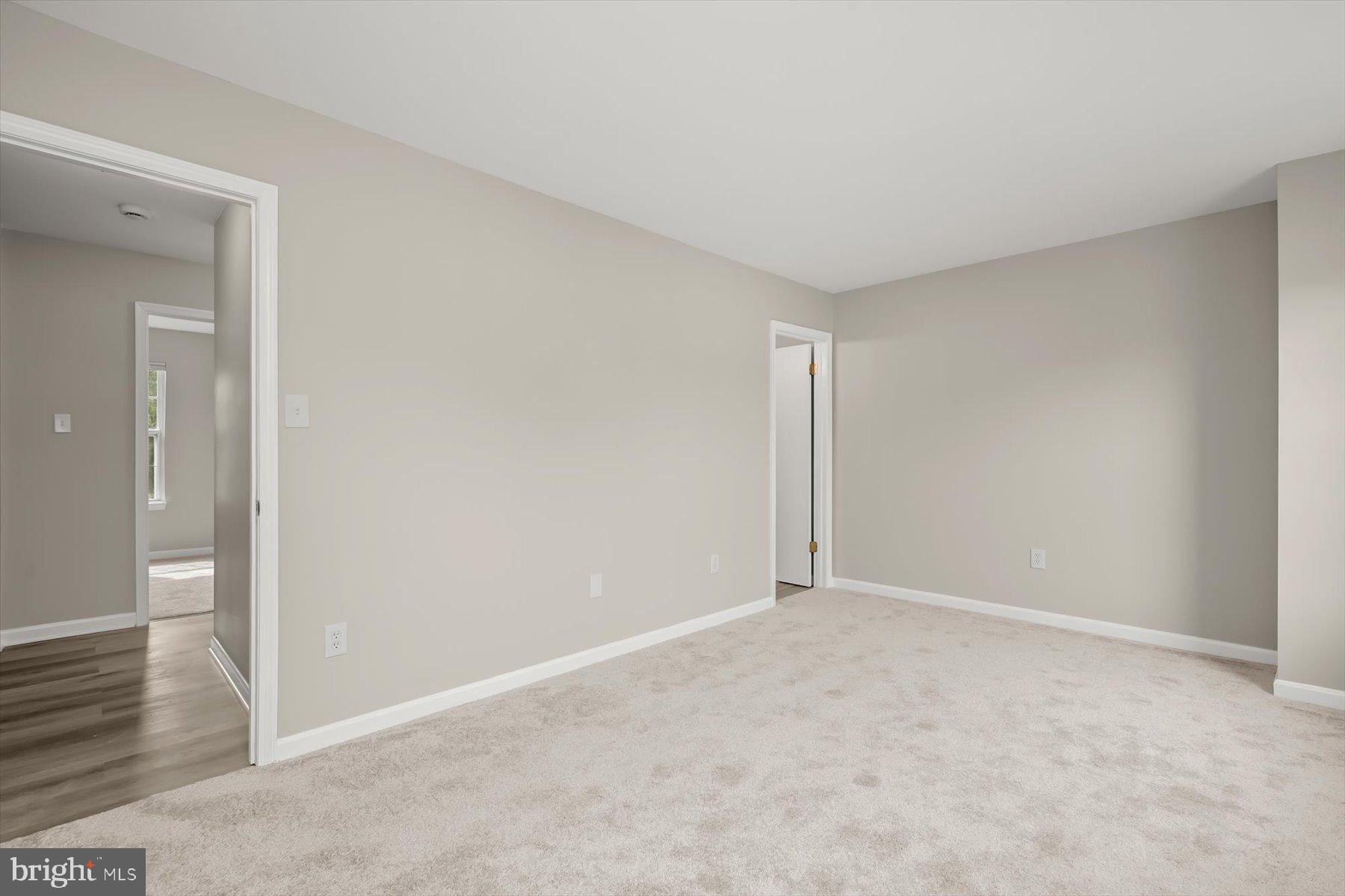 17 Offspring Court Perry Hall, MD 21128 - Photo 18 of 42 a view of an empty room and wooden floor