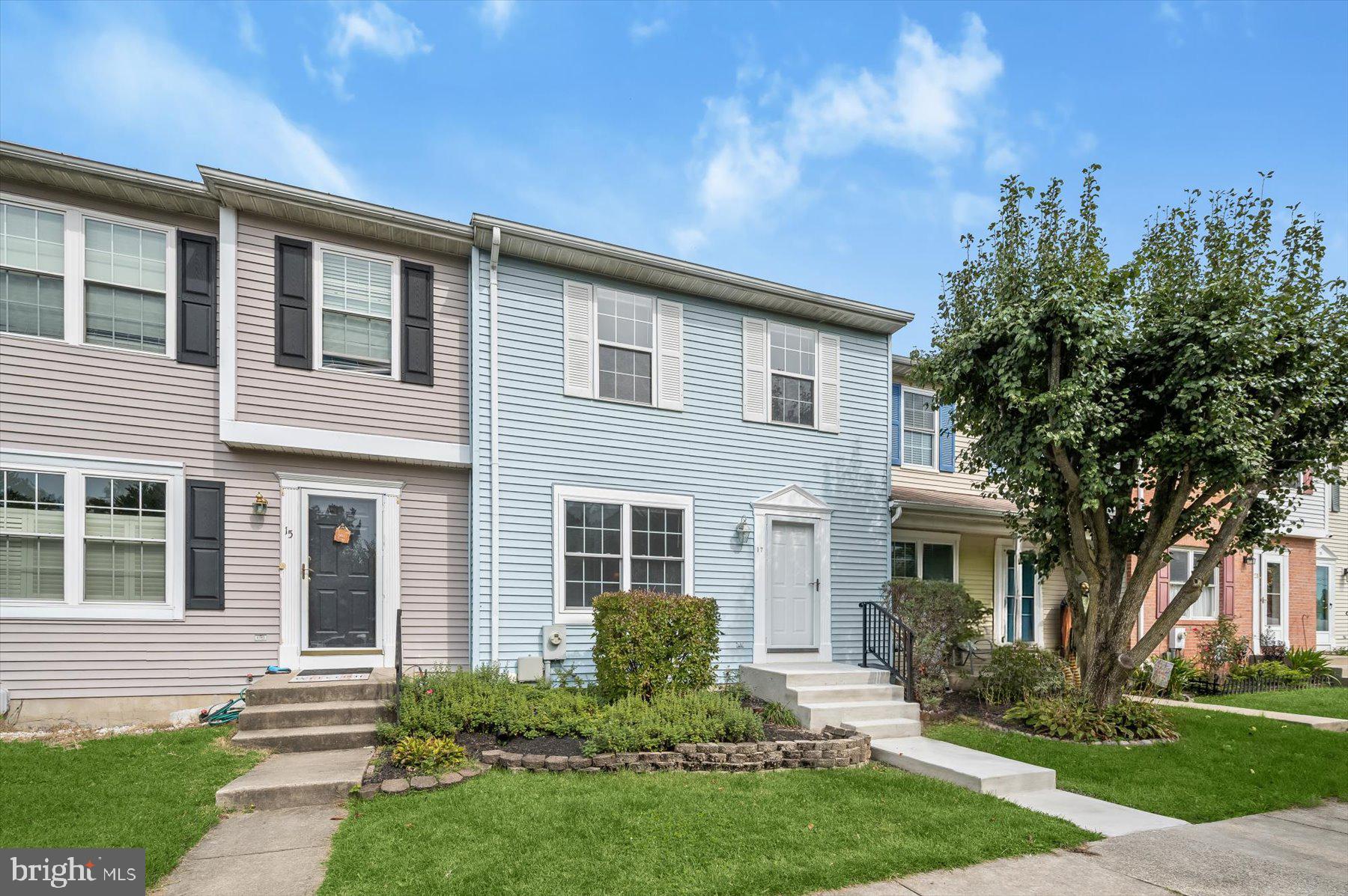 17 Offspring Court Perry Hall, MD 21128 - Photo 2 of 42 a front view of a house with a yard