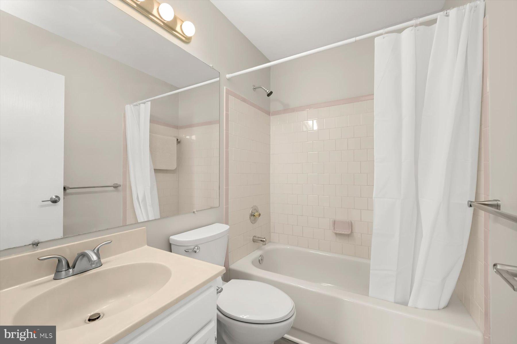 17 Offspring Court Perry Hall, MD 21128 - Photo 22 of 42 a bathroom with a sink a toilet and a bathtub