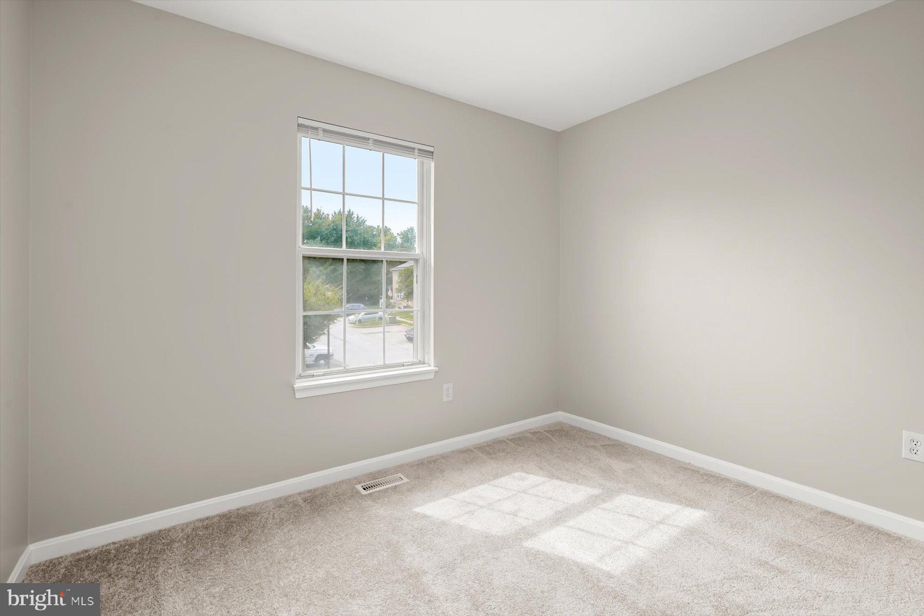 17 Offspring Court Perry Hall, MD 21128 - Photo 23 of 42 an empty room with a window