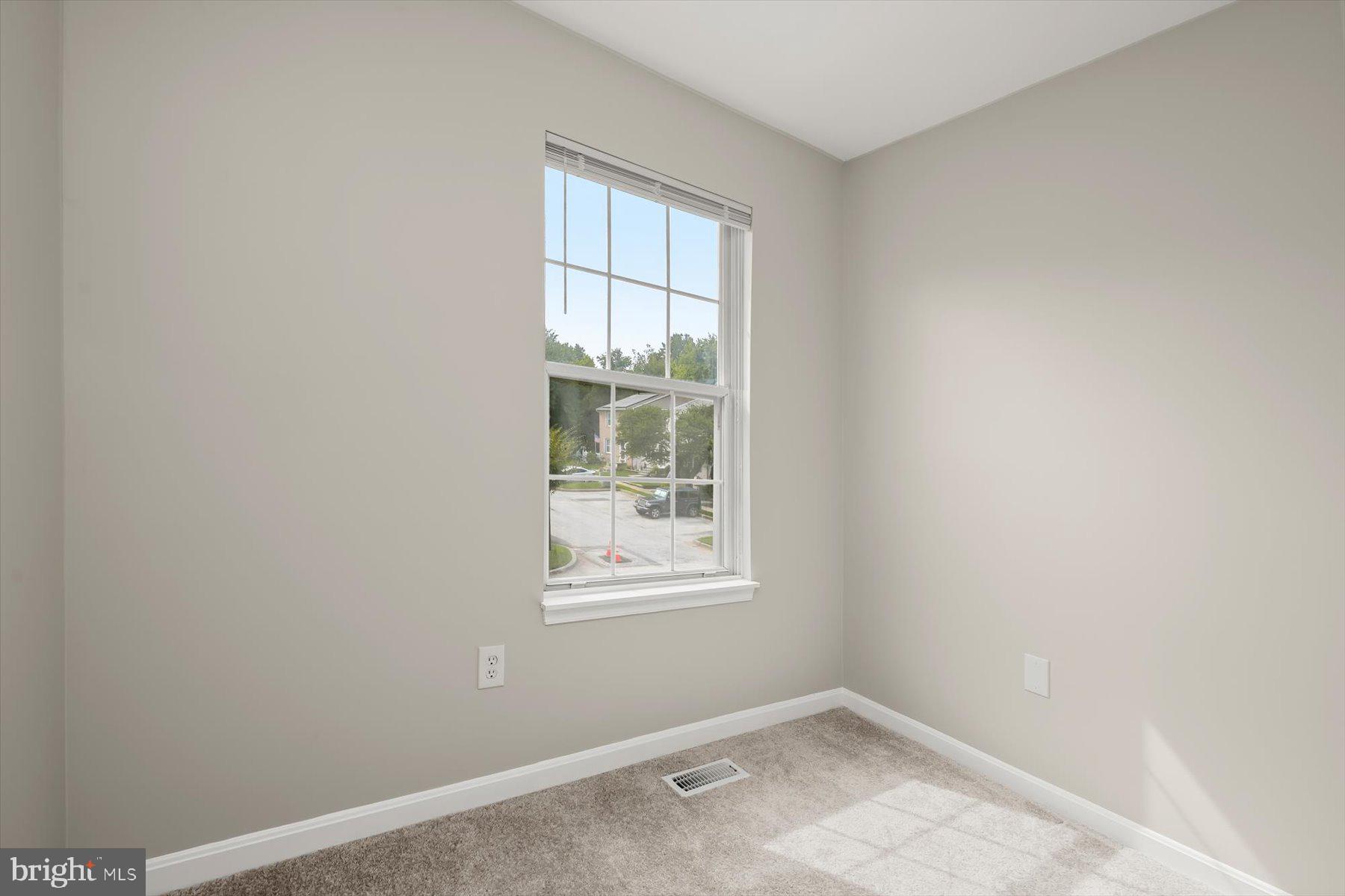 17 Offspring Court Perry Hall, MD 21128 - Photo 28 of 42 an empty room with a window