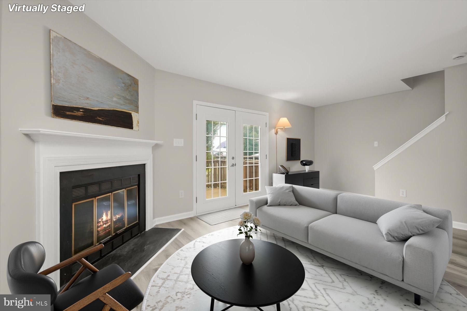 17 Offspring Court Perry Hall, MD 21128 - Photo 5 of 42 a living room with furniture and a fireplace