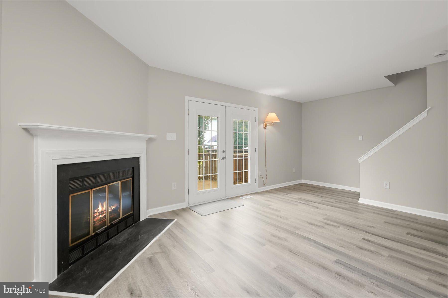 17 Offspring Court Perry Hall, MD 21128 - Photo 6 of 42 a view of an empty room with a fireplace and a window