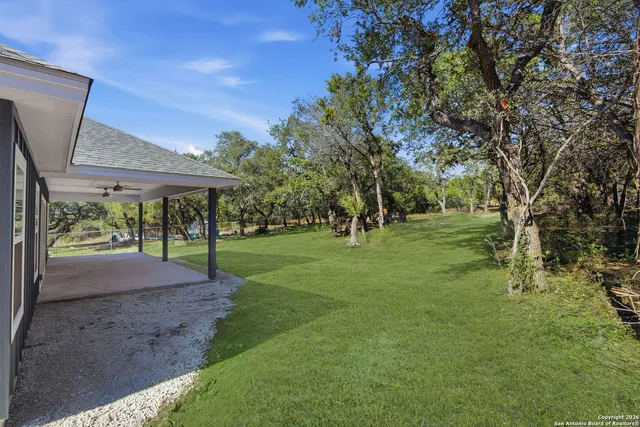 a view of a house with a big yard