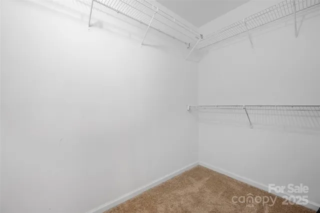 a view of a room with racks on the wall