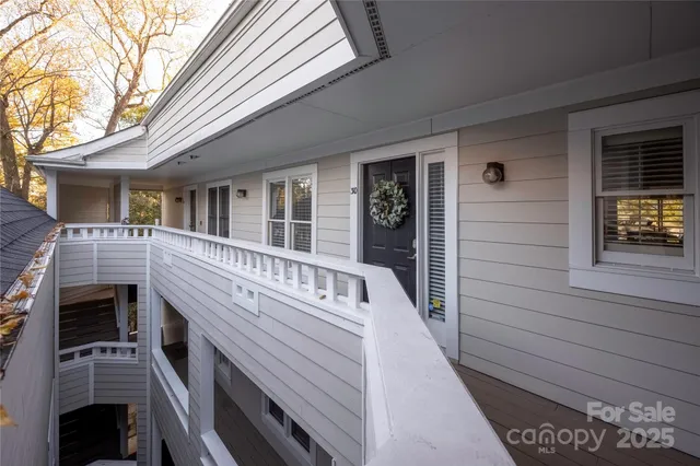 a view of an wooden house with a large window