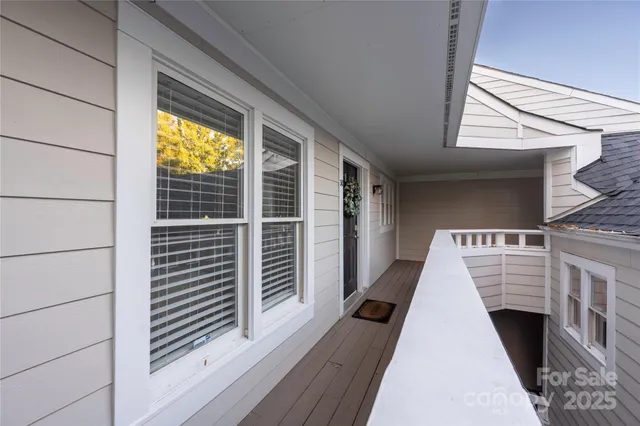 a view of a balcony with window