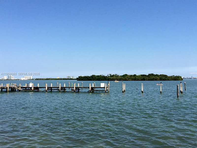 700 Northeast 63rd Street, Unit D609 Miami, FL 33138 - Photo 5 of 7 a view of a lake with outdoor space