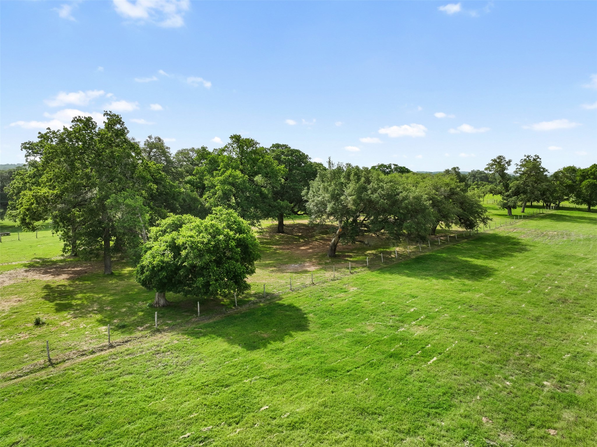 957 St Schulenburg Tx 78956 Schulenburg, TX 78956 - Photo 12 of 22 a backyard of a house with a yard and outdoor seating
