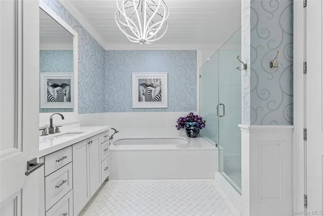 a bathroom with a sink a toilet and a bathtub