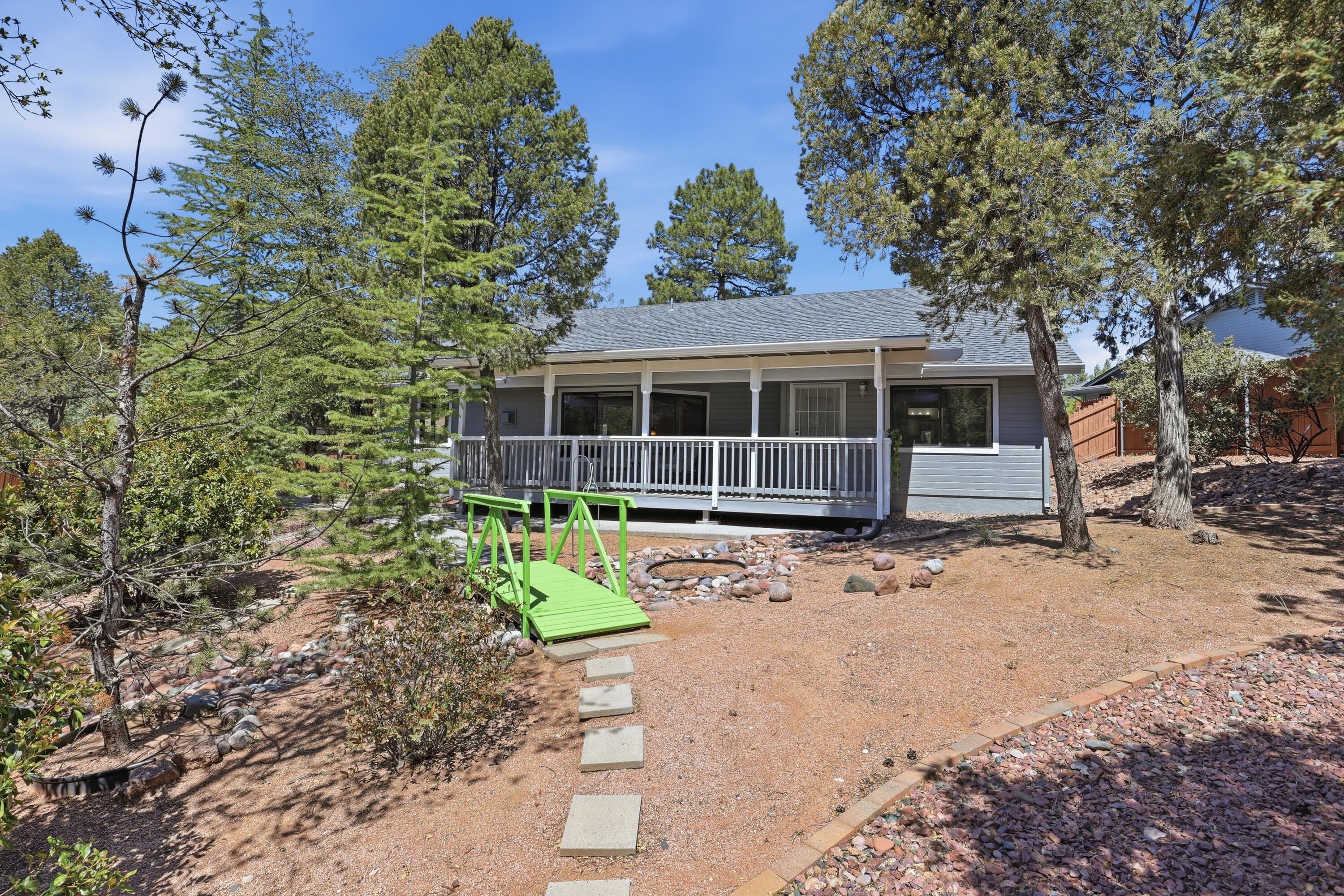 910 West Wagon Trail Payson, AZ 85541 - Photo 29 of 35 a house with trees in the background