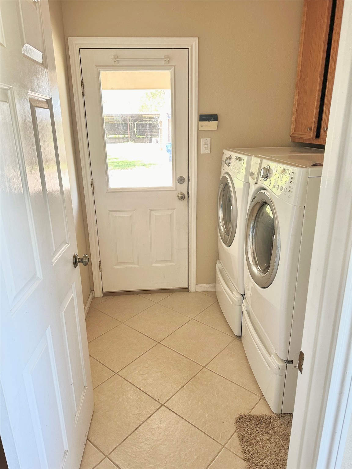 19303 Becker Road Hockley, TX 77447 - Photo 15 of 17 a utility room with dryer and washer