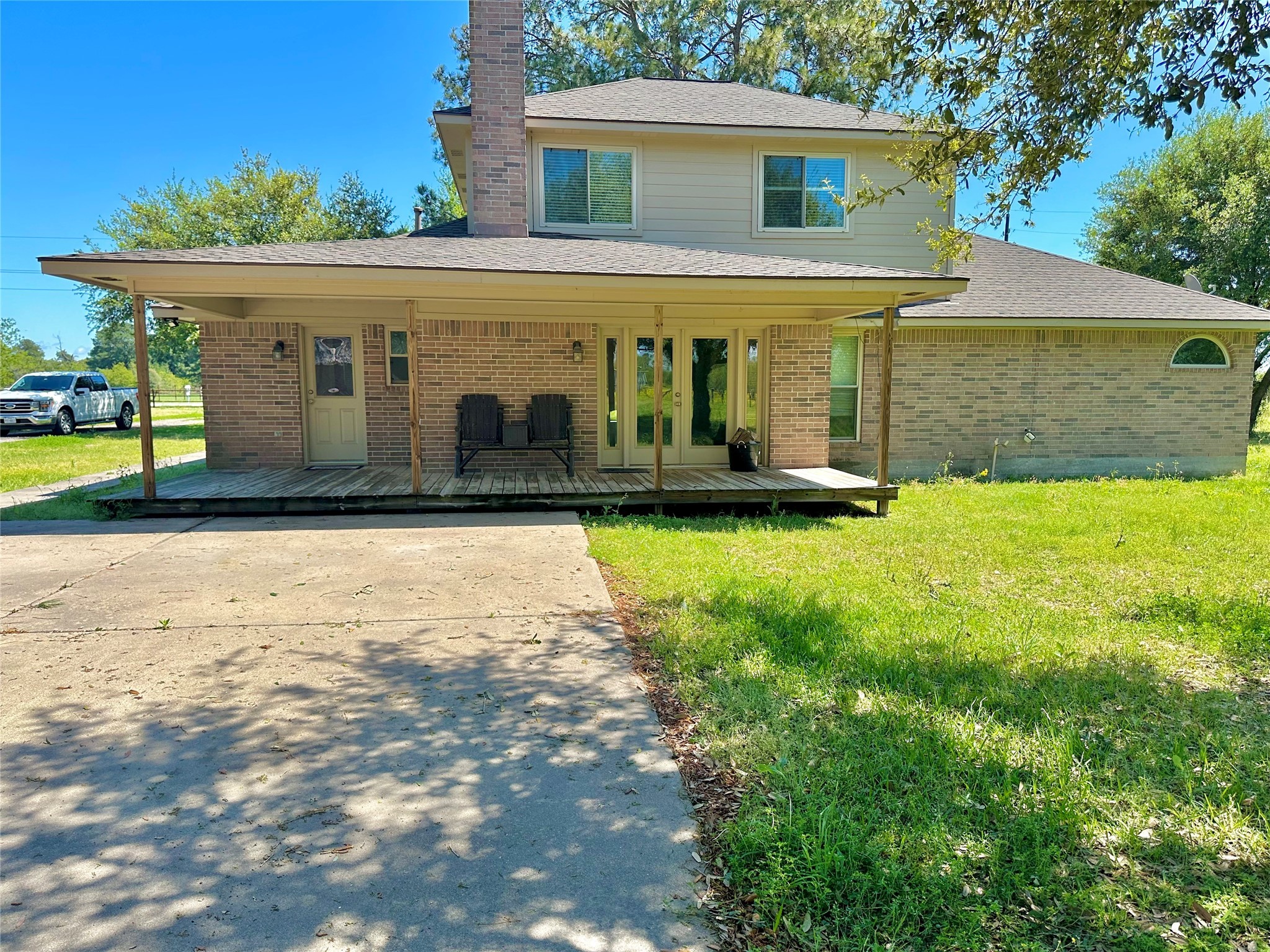 19303 Becker Road Hockley, TX 77447 - Photo 16 of 17 a view of a house with a yard