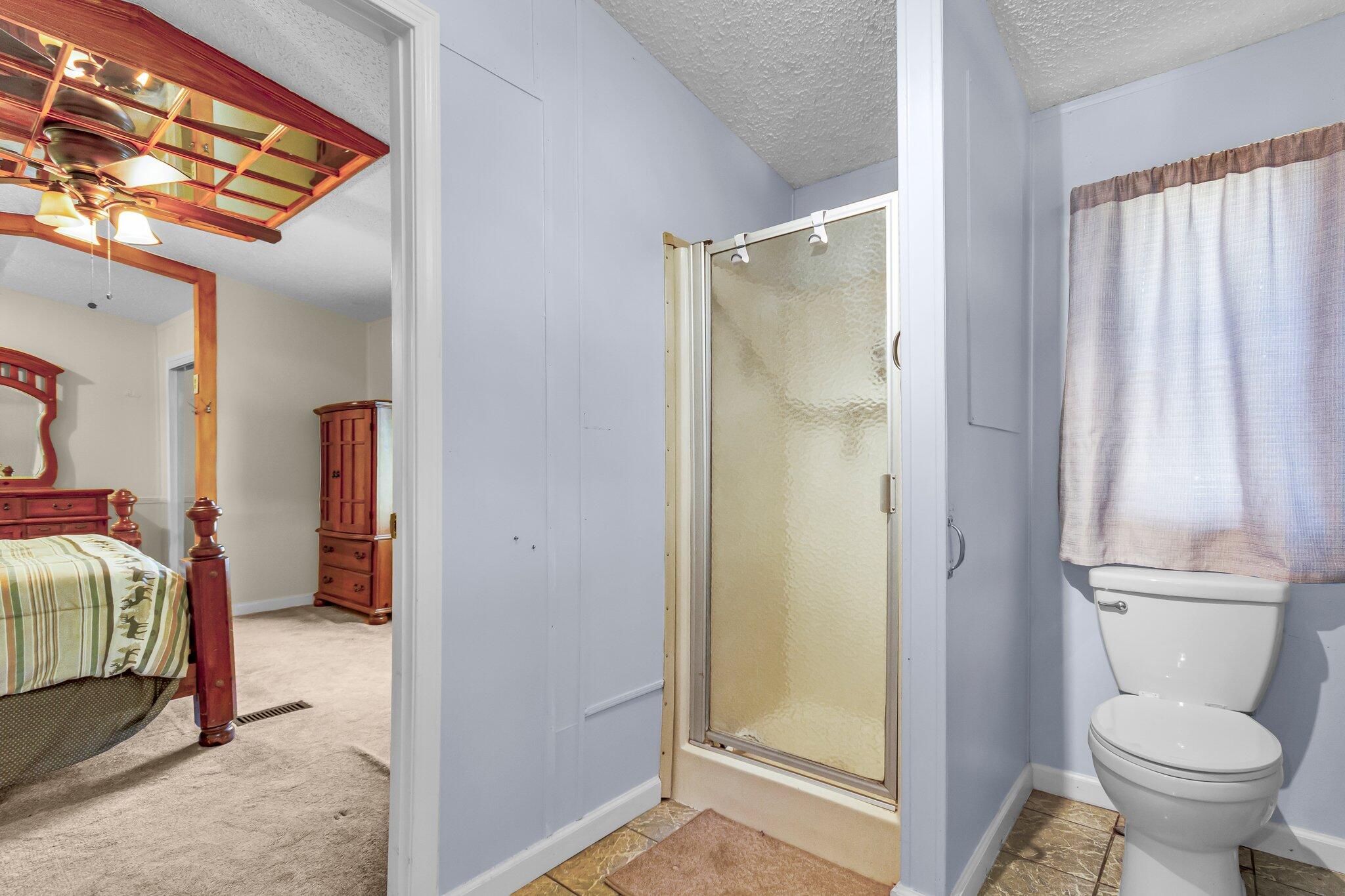 2 Sarah Lane Fort Walton Beach, FL 32547 - Photo 25 of 41 a bathroom with a toilet and a shower