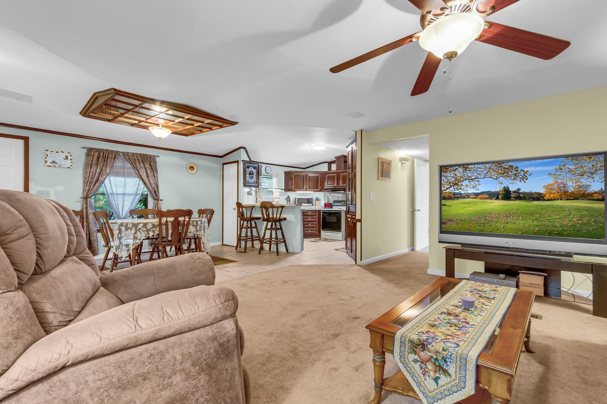 2 Sarah Lane Fort Walton Beach, FL 32547 - Photo 29 of 41 a living room with furniture and a flat screen tv