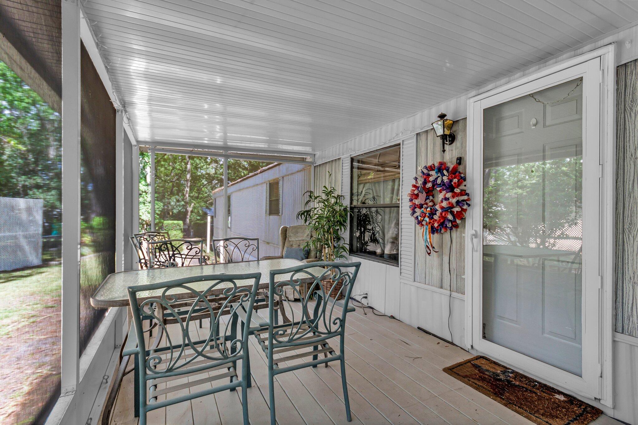 2 Sarah Lane Fort Walton Beach, FL 32547 - Photo 31 of 41 a view of a dining room with furniture window and outside view