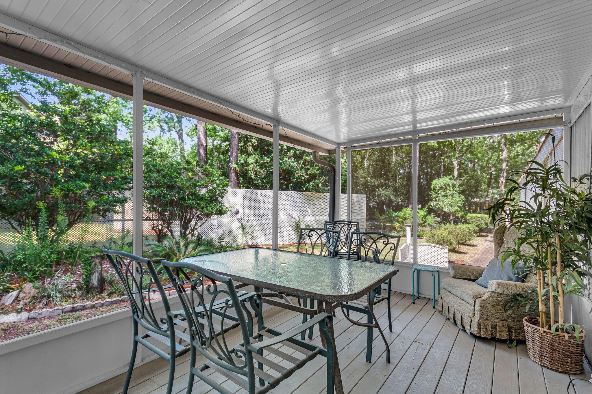 2 Sarah Lane Fort Walton Beach, FL 32547 - Photo 32 of 41 a patio with yard glass top table and chairs