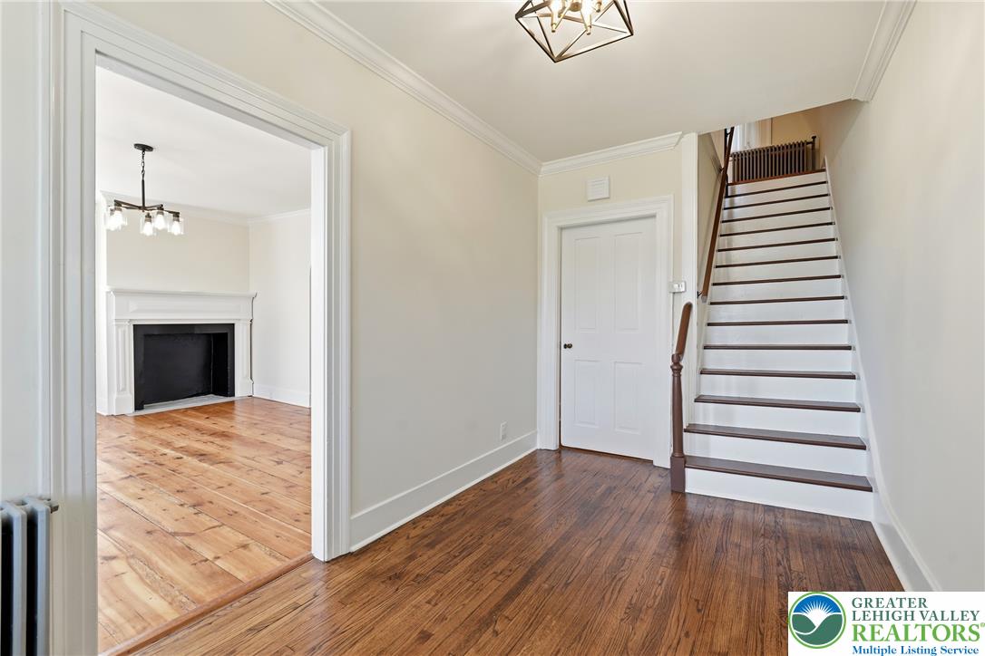 4682 Steuben Road Bethlehem, PA 18020 - Photo 5 of 79 Rich hardwood floors welcome you to this inviting entry, revealing a classic staircase and elegant trim.