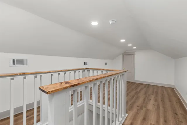 a view of entryway with wooden floor