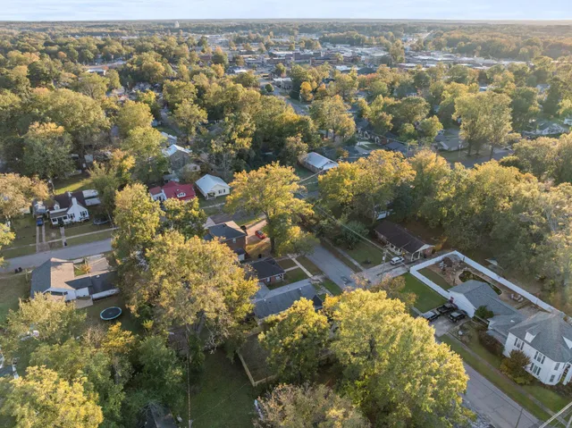 an aerial view of residential house with outdoor space
