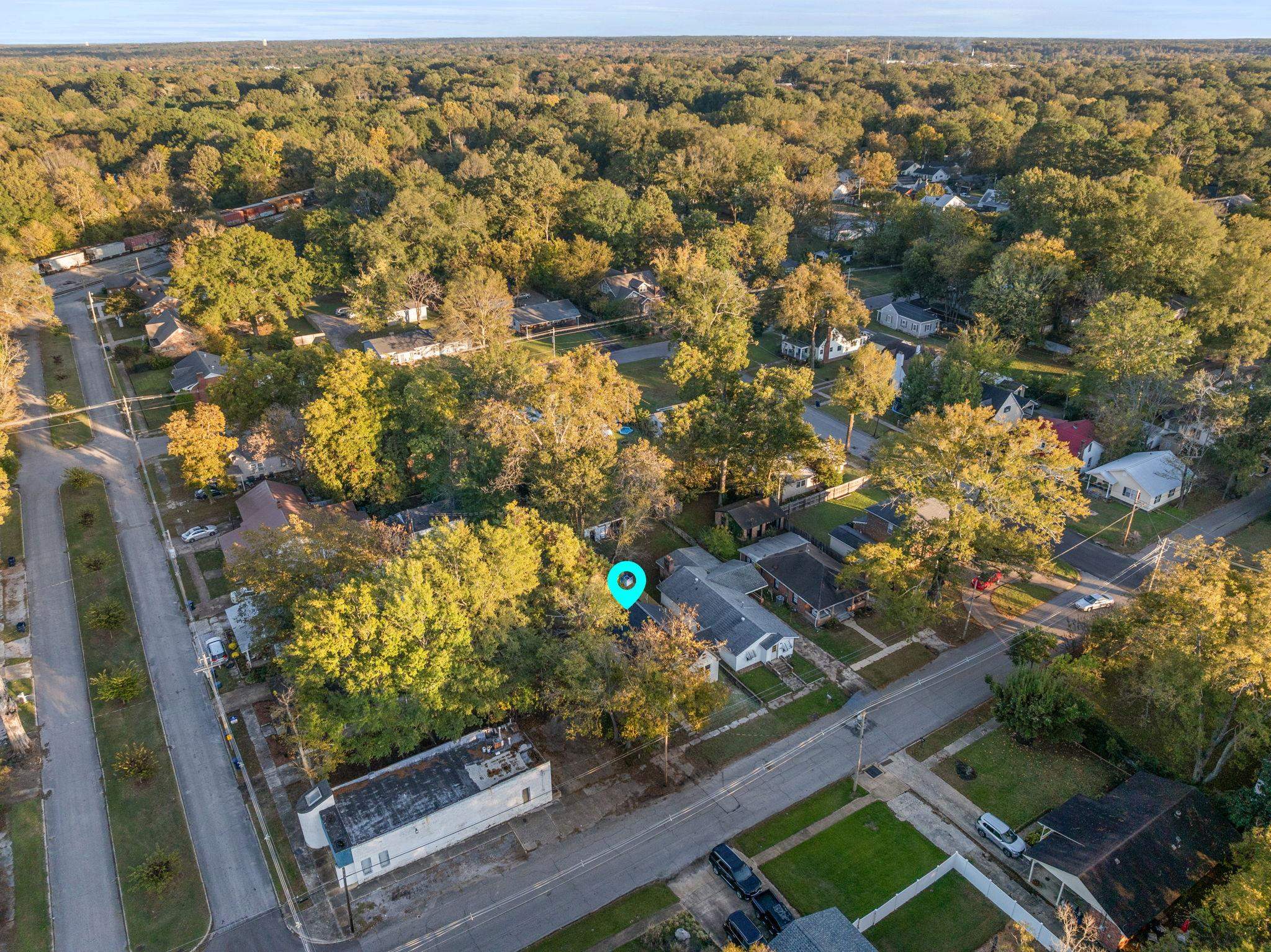 1008 North Madison Street Corinth, MS 38834 - Photo 28 of 33 an aerial view of residential houses with outdoor space