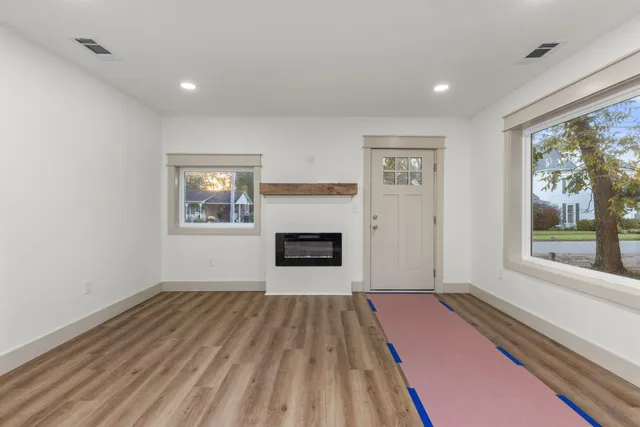 an empty room with windows