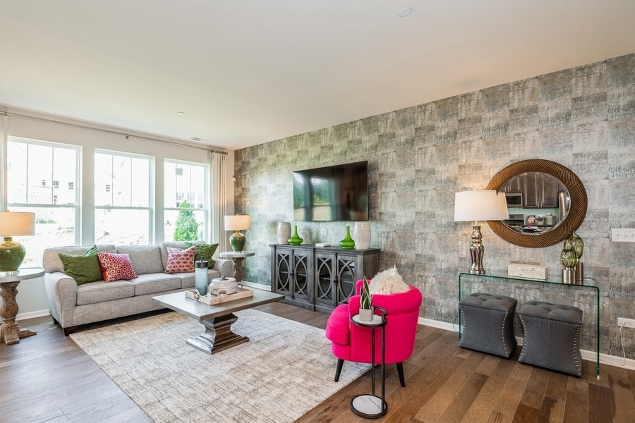1323 Draper Road McHenry, IL 60050 - Photo 13 of 17 a living room with furniture and a flat screen tv