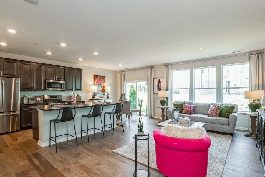 1323 Draper Road McHenry, IL 60050 - Photo 6 of 17 a living room with furniture kitchen view and a large window
