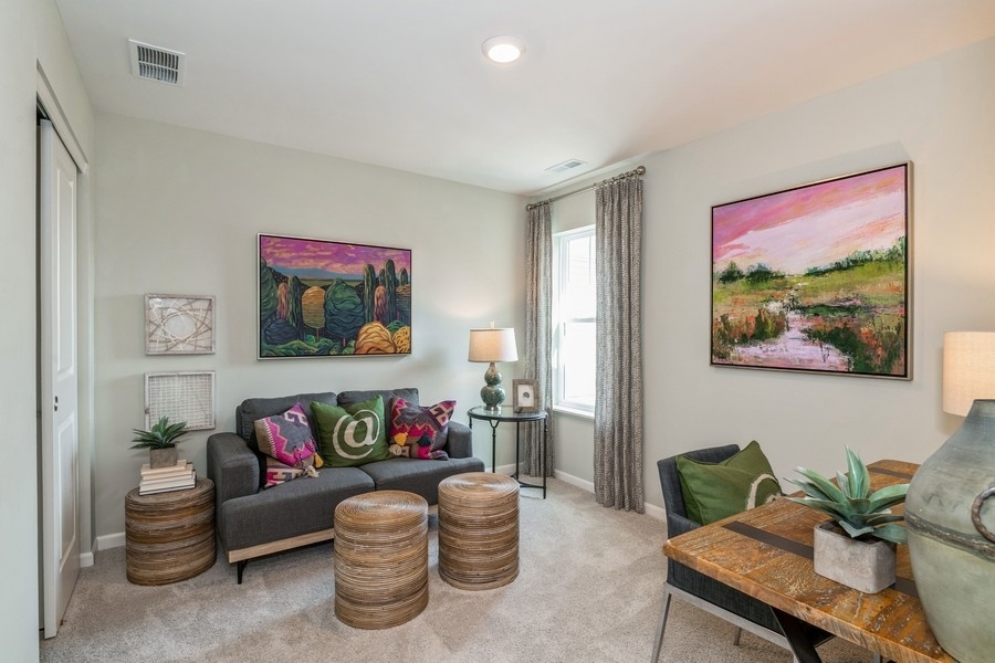1323 Draper Road McHenry, IL 60050 - Photo 10 of 17 a living room with furniture and a potted plant