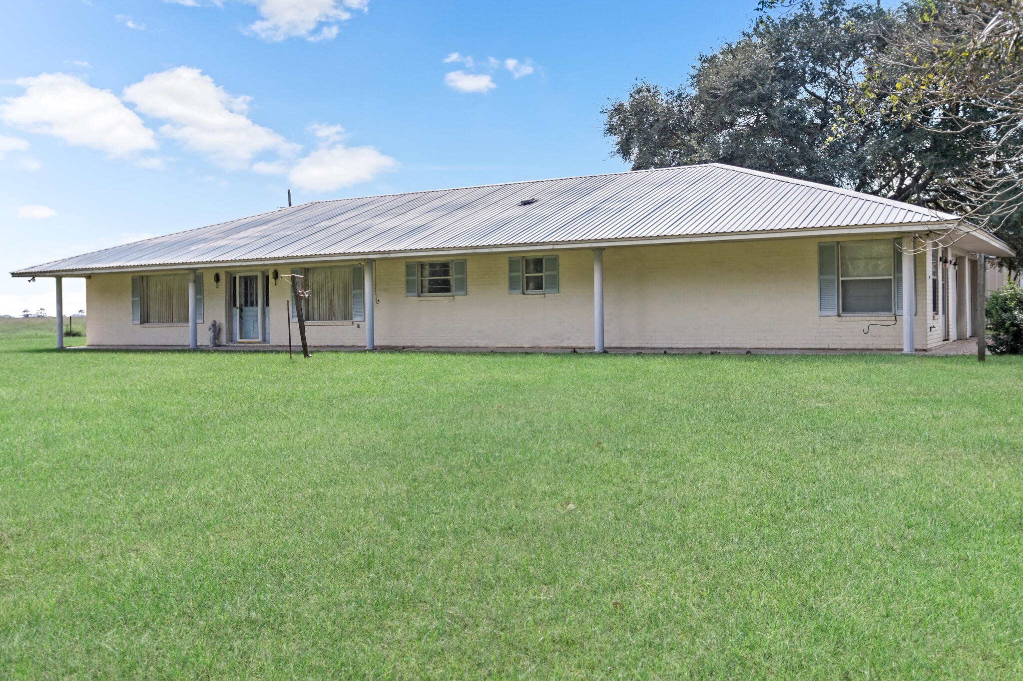 3030 Moore Road Beaumont, TX 77713 - Photo 37 of 38 a front view of a house with yard and green space