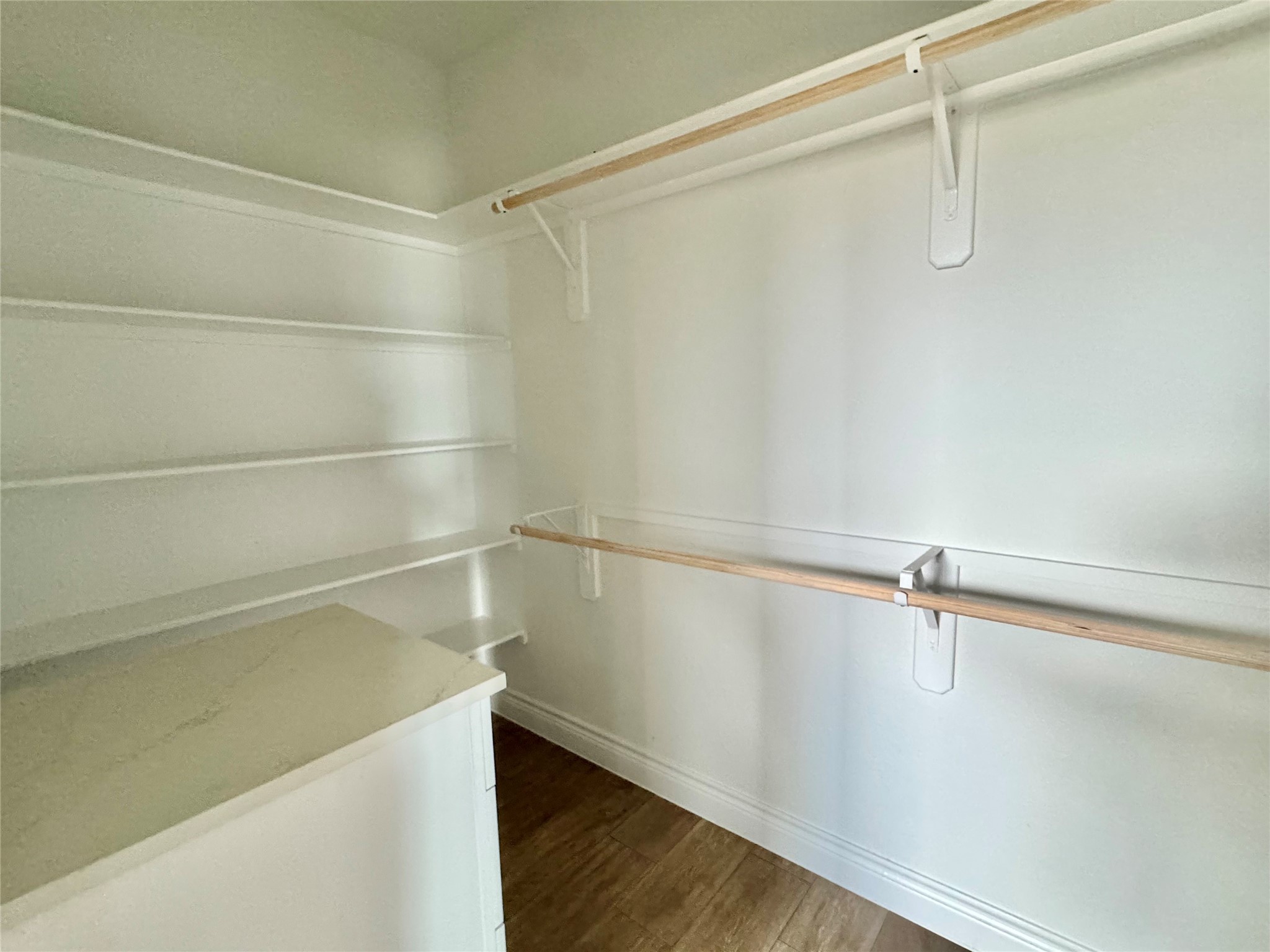 1165 Road 5203 Cleveland, TX 77327 - Photo 14 of 20 a view of a room with racks on the wall