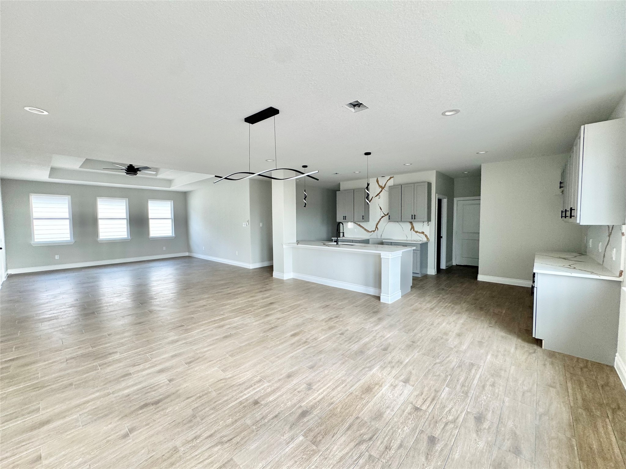 1165 Road 5203 Cleveland, TX 77327 - Photo 3 of 20 a view of a kitchen with a sink and a large window