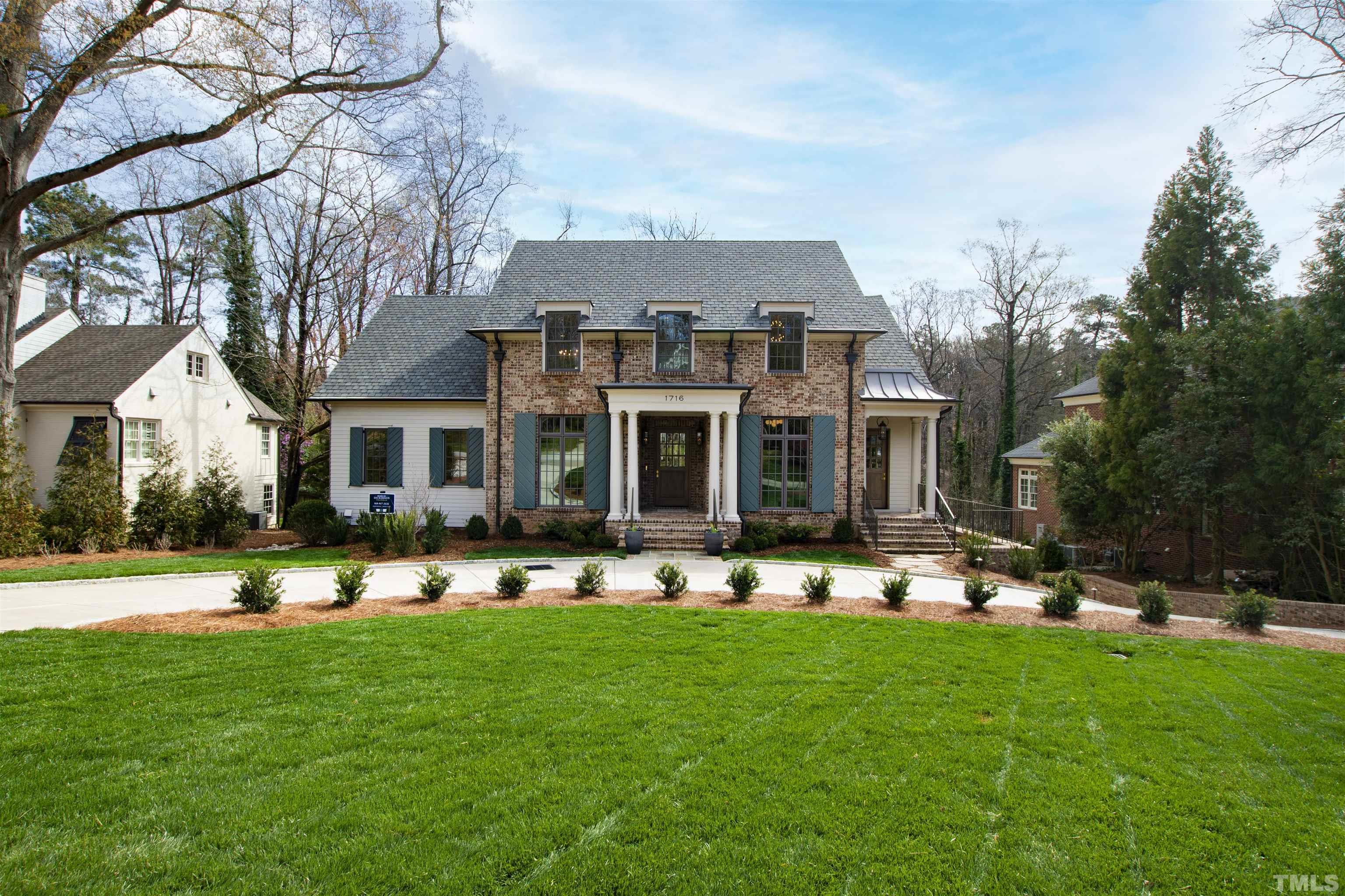 a front view of house with yard